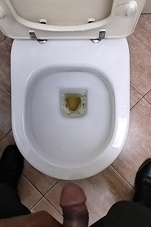Pissing-in-toilet-